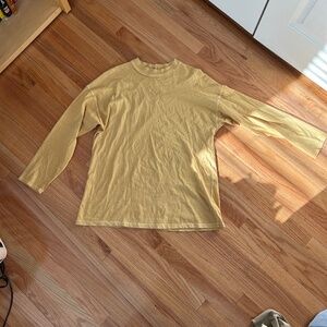 We The Free by Free People Be Free Tunic T-Shirt Long Sleeve in Mustard Yellow